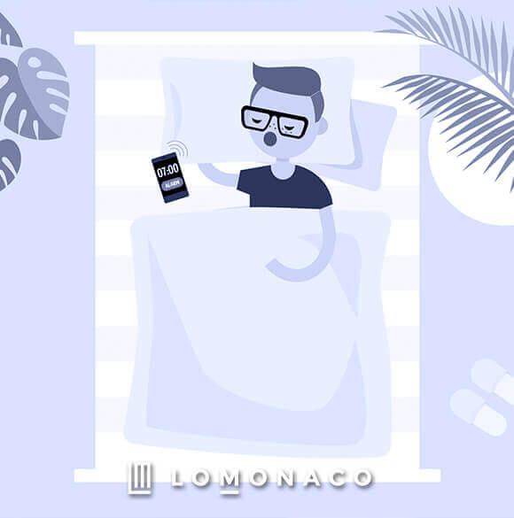 Imagen animada de un chico durmiendo en la cam acon un teléfono móvil al lado suya